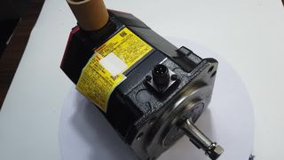 Fanuc A06B-0243-B100 เซอร์โวมอเตอร์ AC – ภาพรวมชิ้นส่วน OEM และคุณสมบัติที่สำคัญ